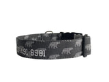 Whether choosing from a traditional dog collar, embroidered dog collar, or engraved buckle dog collar, you’ll find a great selection of personalized dog collars to choose from.  Duke & Fox® personalized dog collars come in a variety of unique styles and patterns. Our embroidered collars and engraved buckle collars also add to your dog's safety and your peace of mind with critical contact information should you and your dog get separated.  Charcoal bear dog collar. 