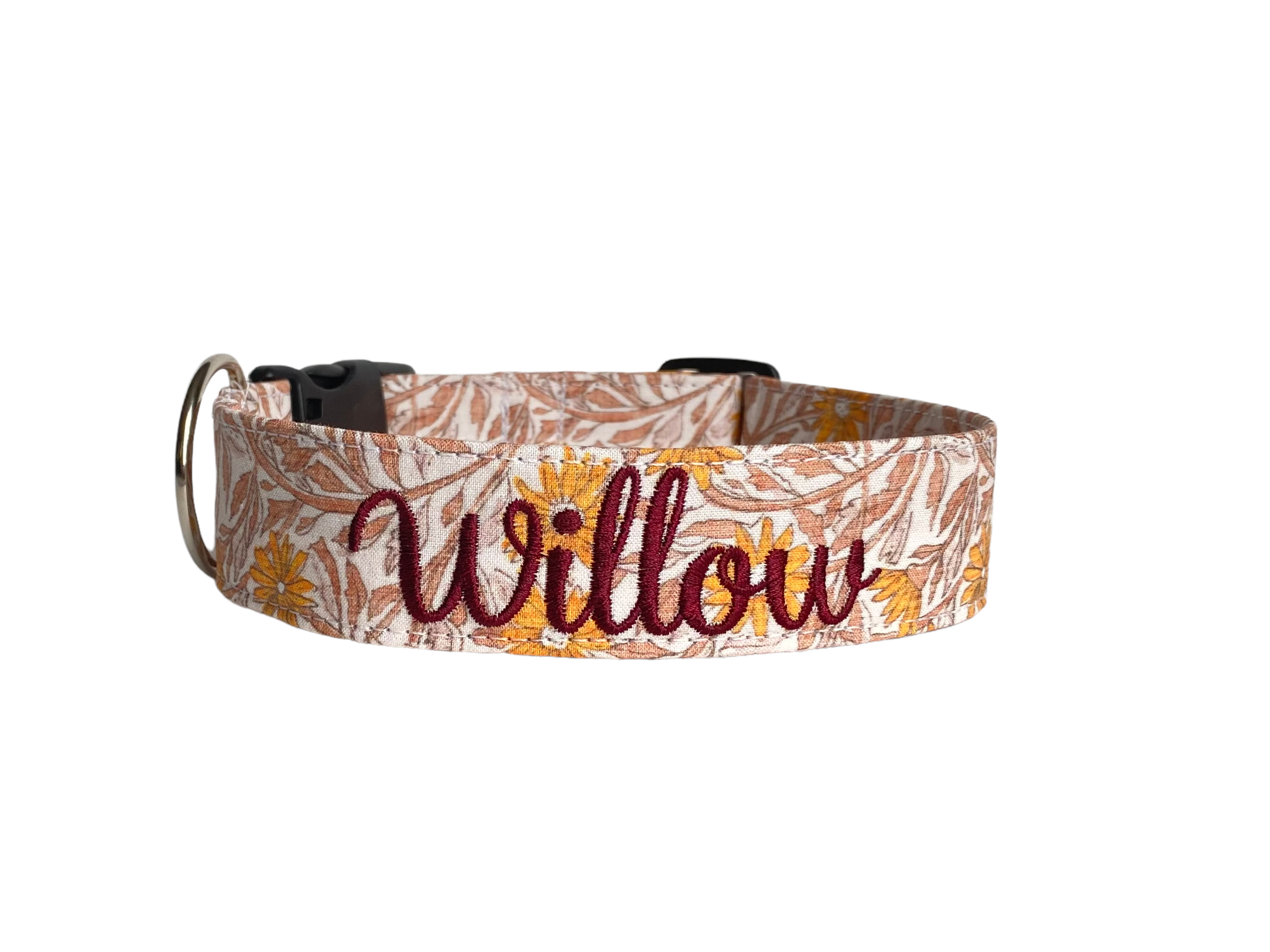 Whether choosing from a traditional dog collar, embroidered dog collar, or engraved buckle dog collar, you’ll find a great selection of personalized dog collars to choose from.  Duke & Fox® personalized dog collars come in a variety of unique styles and patterns. Our embroidered collars and engraved buckle collars also add to your dog's safety and your peace of mind with critical contact information should you and your dog get separated.  Daisies and vines dog collar. 