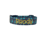 Whether choosing from a traditional dog collar, embroidered dog collar, or engraved buckle dog collar, you’ll find a great selection of personalized dog collars to choose from.  Duke & Fox® personalized dog collars come in a variety of unique styles and patterns. Our embroidered collars and engraved buckle collars also add to your dog's safety and your peace of mind with critical contact information should you and your dog get separated.  Dark Christmas trees dog collar. 