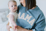 Mama Sweatshirt worn by model holding baby. 